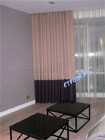 Фото двухцветной рогожки с органзой для штор в гостиной