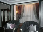 Фото двухслойных штор из шелка в гостиной